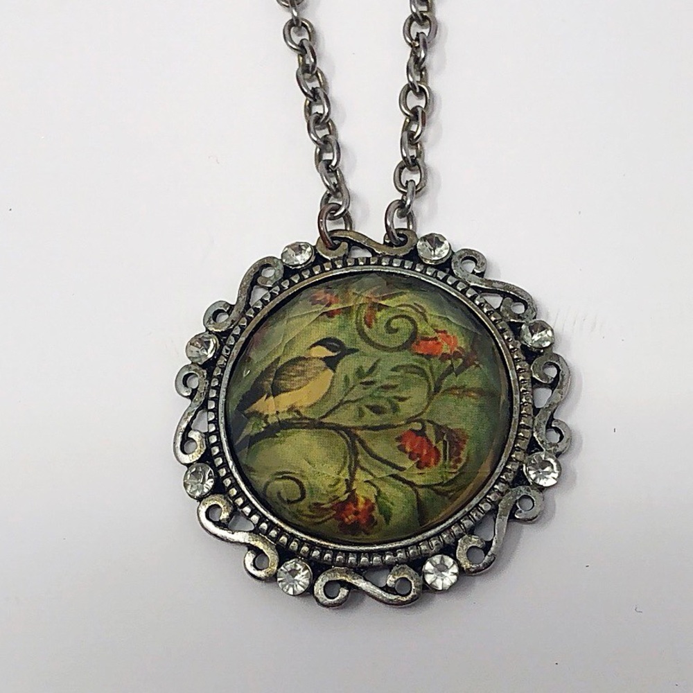 Beveled bird pendant
